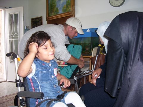 Physically handicapped child with her mother